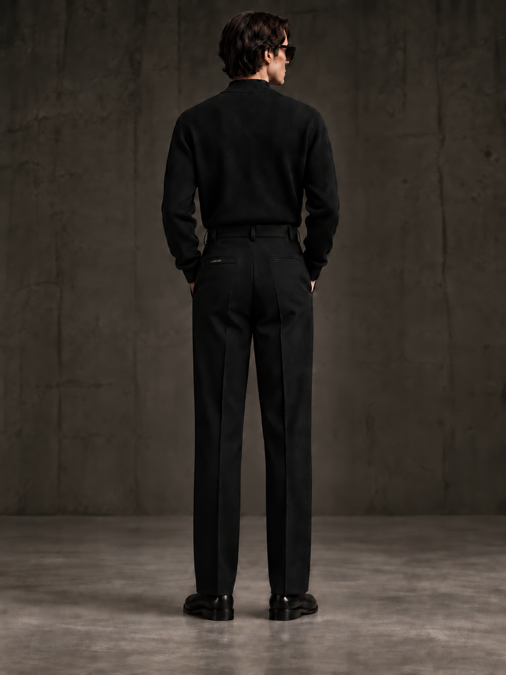 LABOUR TROUSERS 002 — embossed metallic LABOUR wordmark on right rear pocket