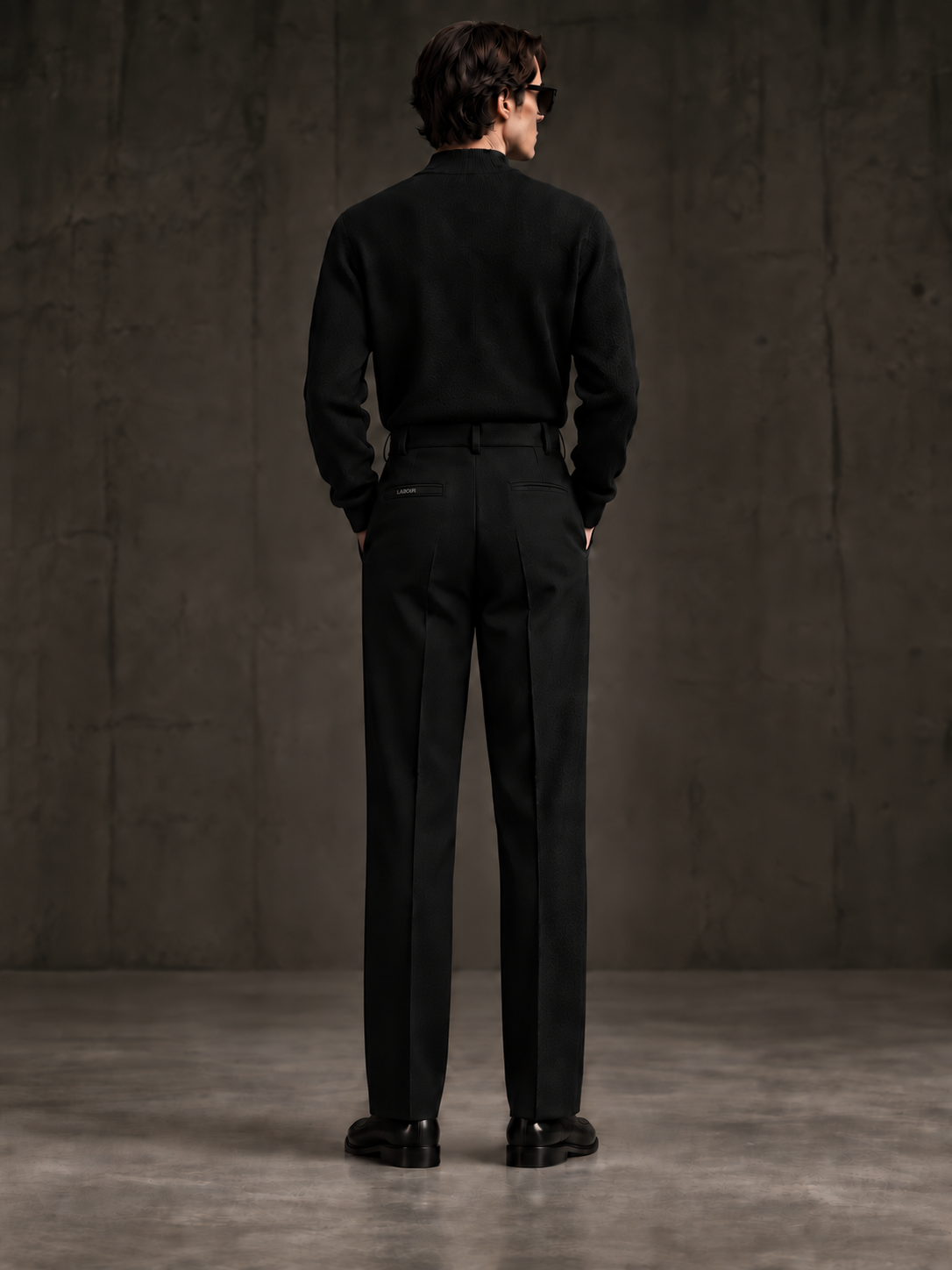 LABOUR TROUSERS 002 — embossed metallic LABOUR wordmark on right rear pocket